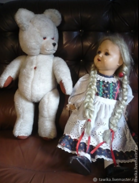 Klassischer Teddybär mit Herz Detail