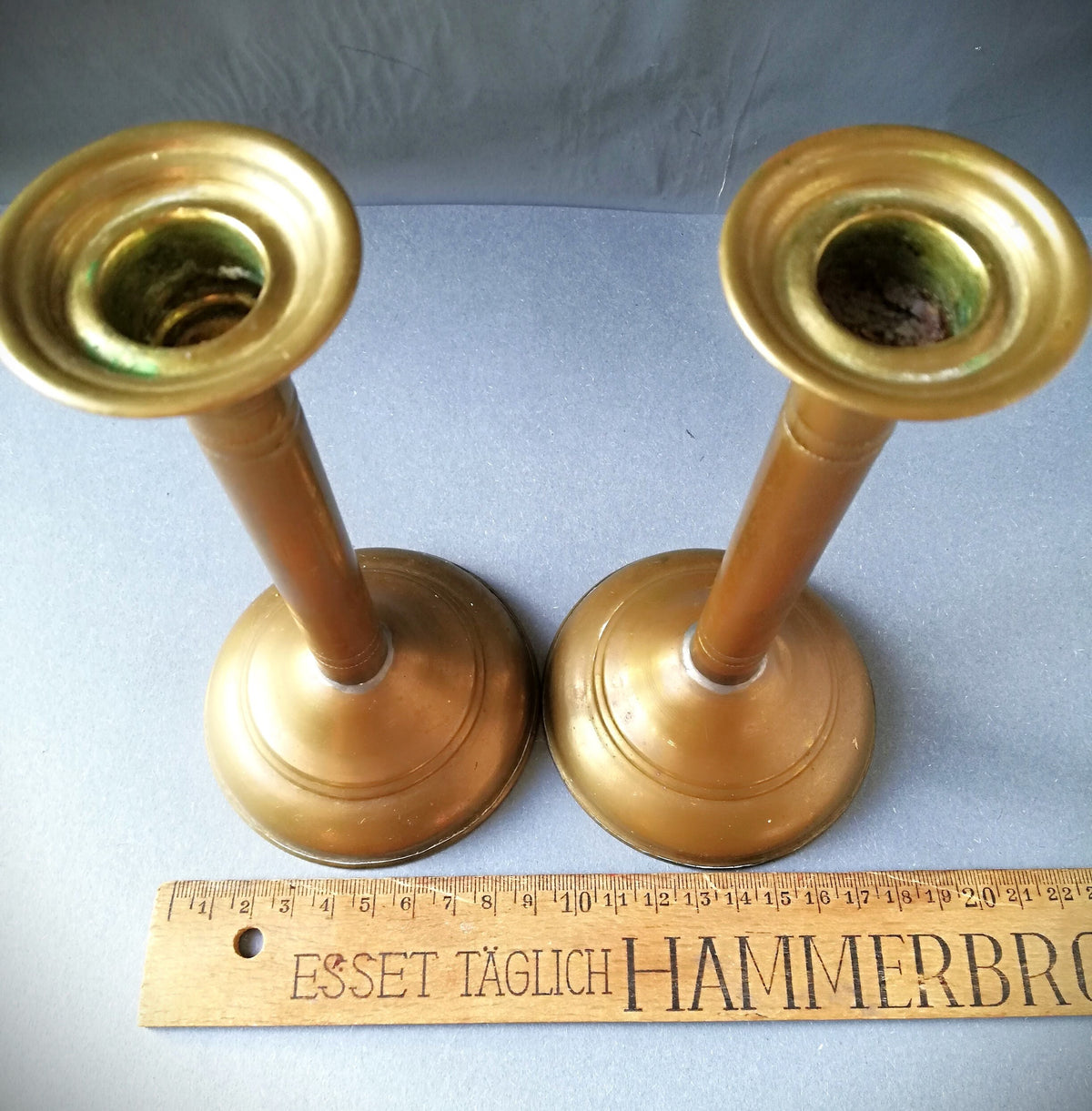An antique brass candle holder, candle holder for a romantic dinner, candle lighting for romantic hours