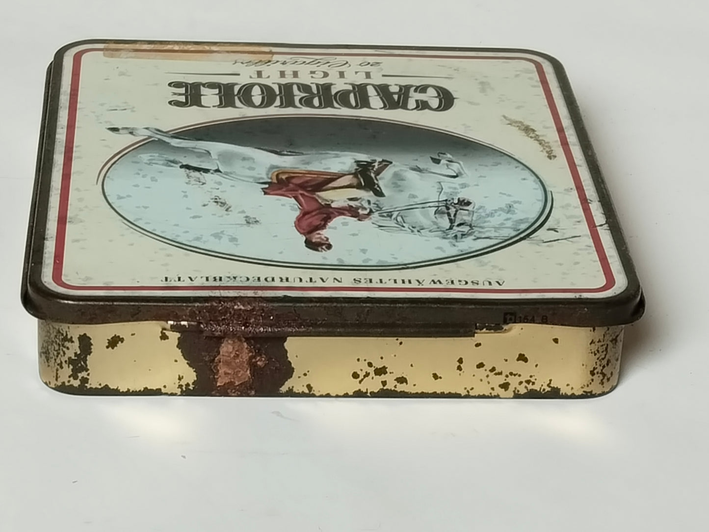 Capriole-Zigarillodose, Deckel umgedreht mit Schriftzug auf dem Kopf