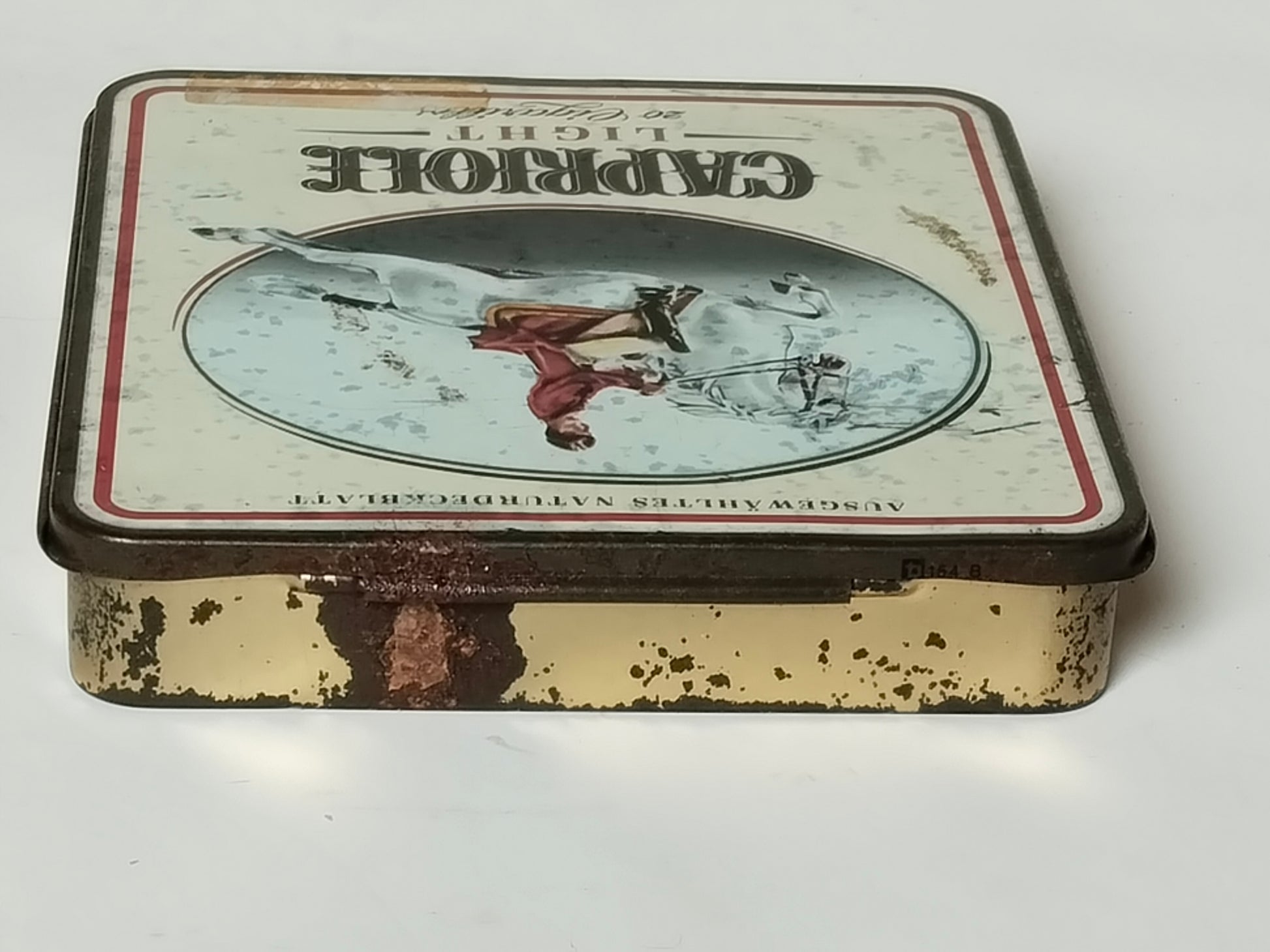 Capriole-Zigarillodose, Deckel umgedreht mit Schriftzug auf dem Kopf