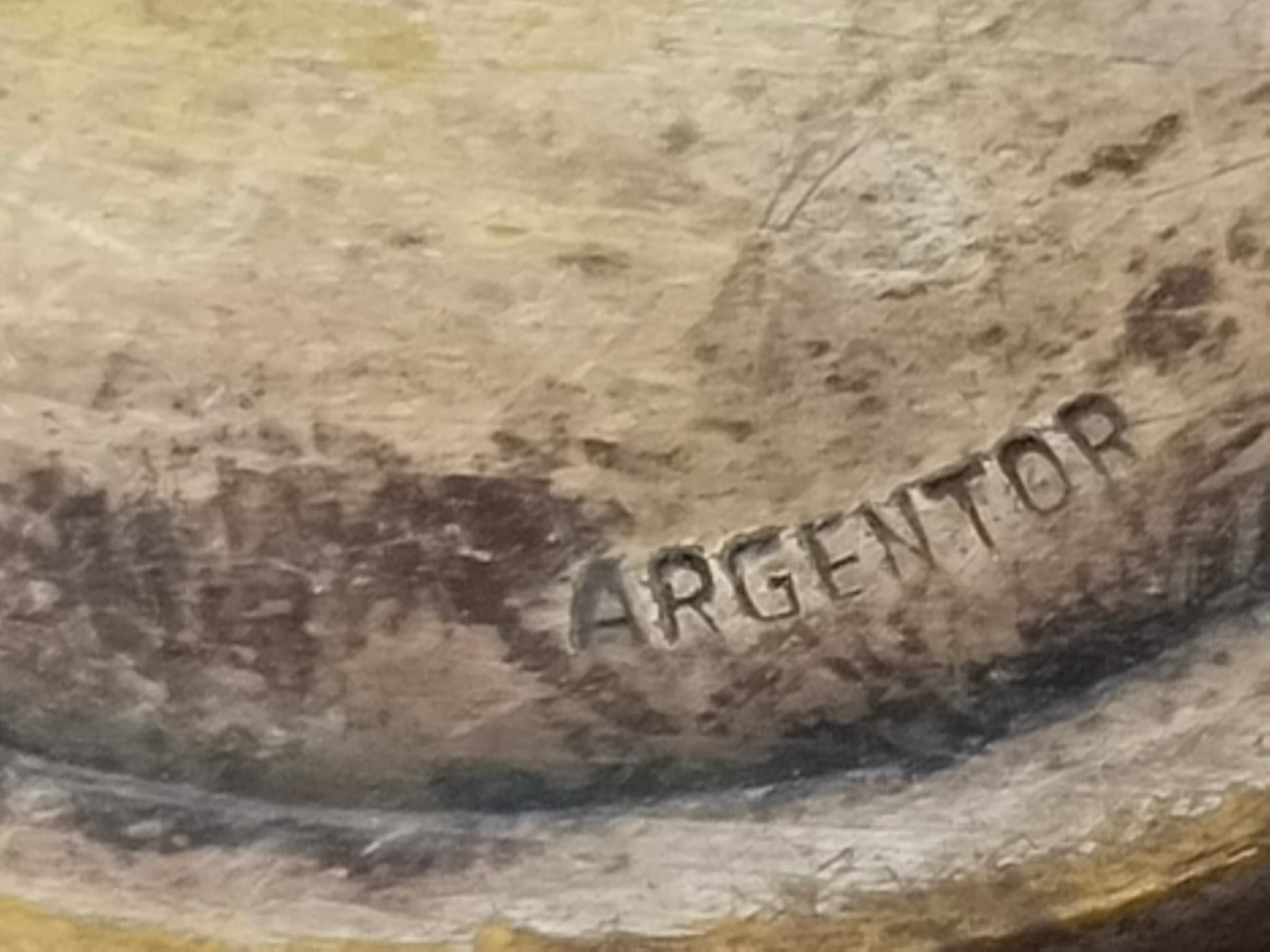 Punze ARGENTOR auf der Rückseite des versilberten Tortenhebers
