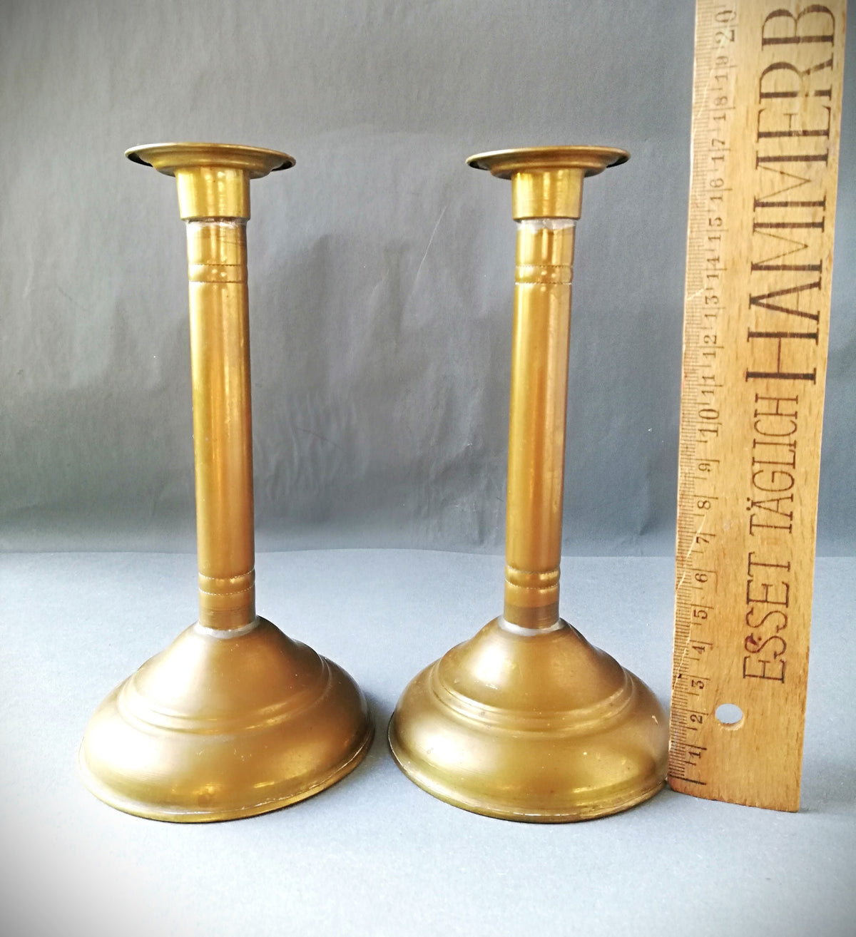 An antique brass candle holder, candle holder for a romantic dinner, candle lighting for romantic hours