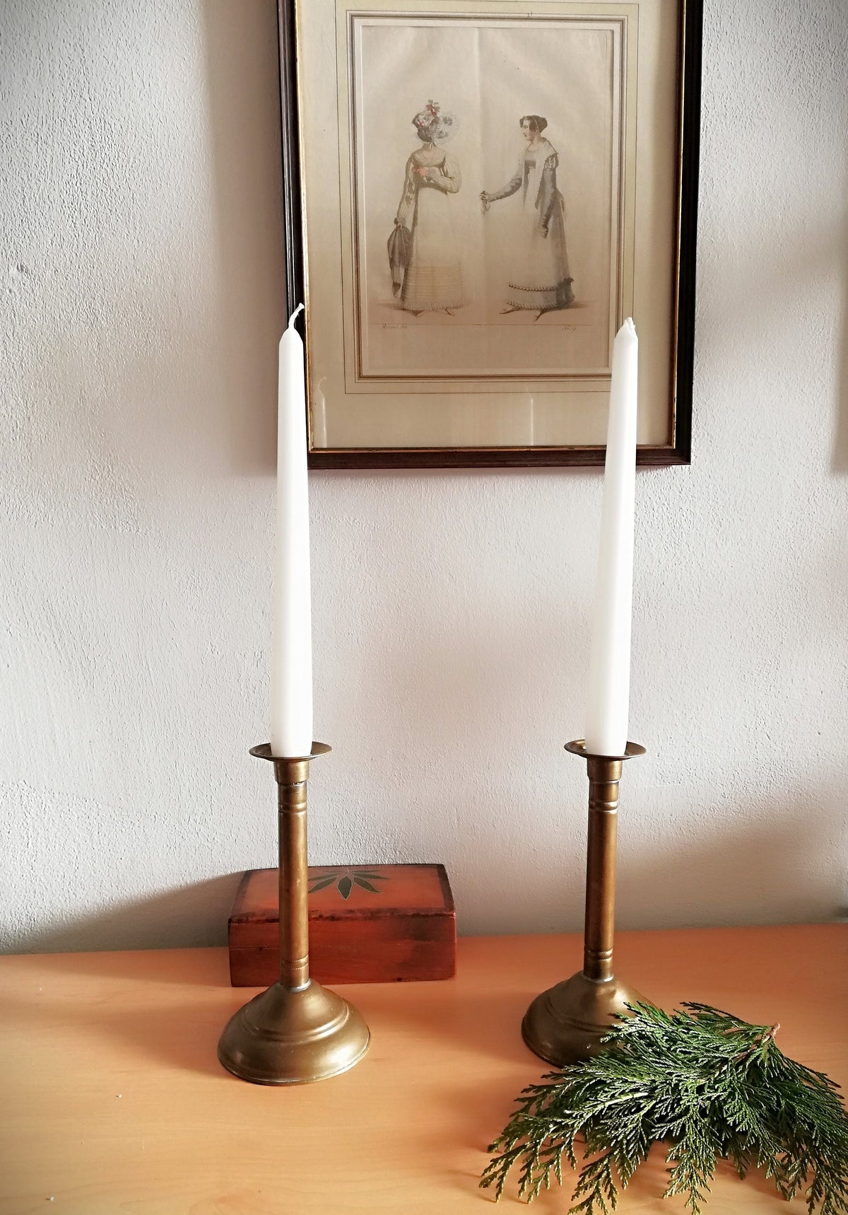 An antique brass candle holder, candle holder for a romantic dinner, candle lighting for romantic hours