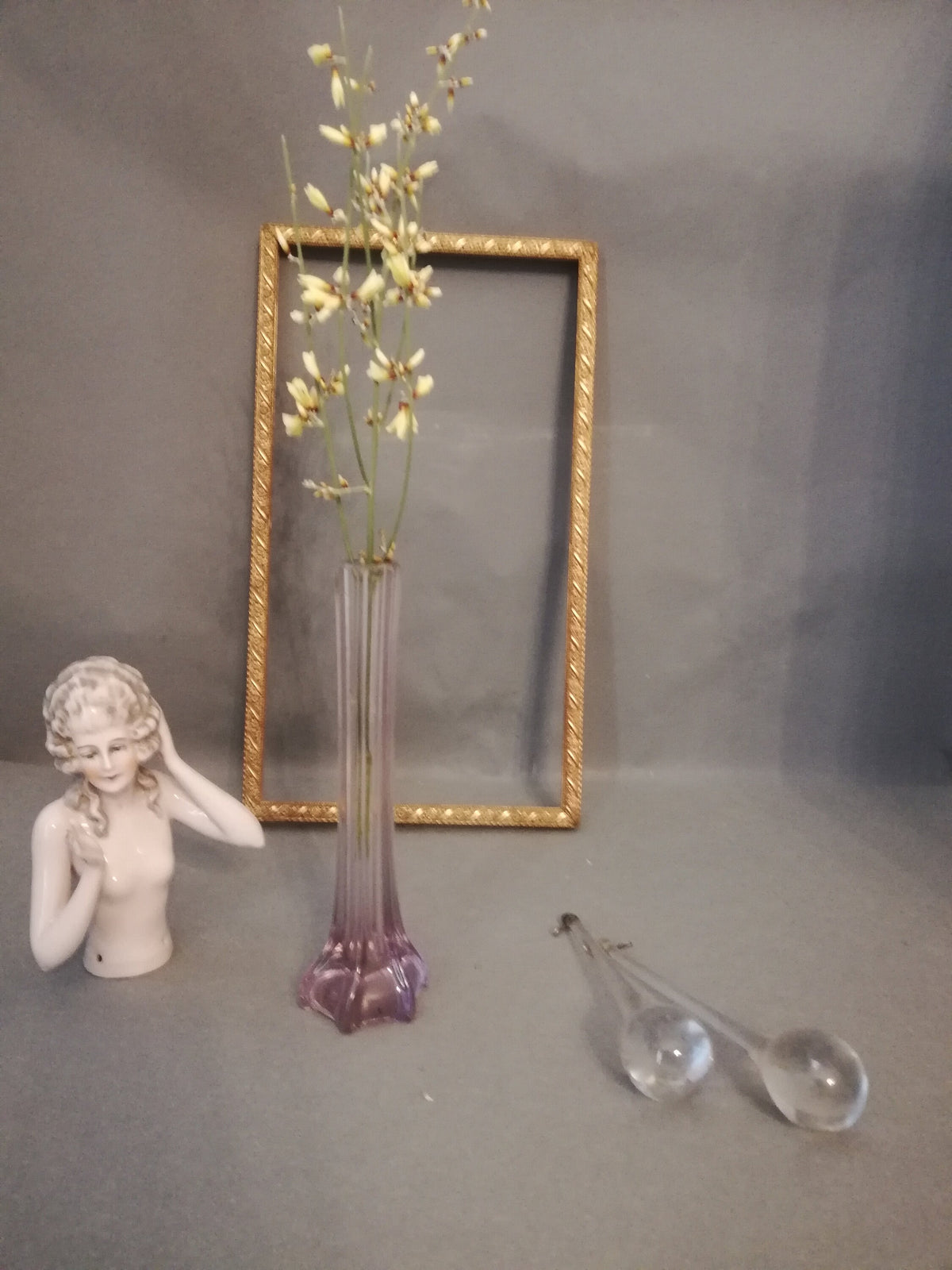 Elegant, narrow flower vase for single-stemmed flowers. graceful vase for the lunch table, purple vase as a flower decoration,