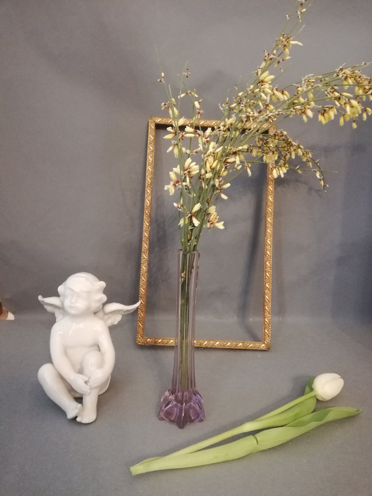 Elegant, narrow flower vase for single-stemmed flowers. graceful vase for the lunch table, purple vase as a flower decoration,