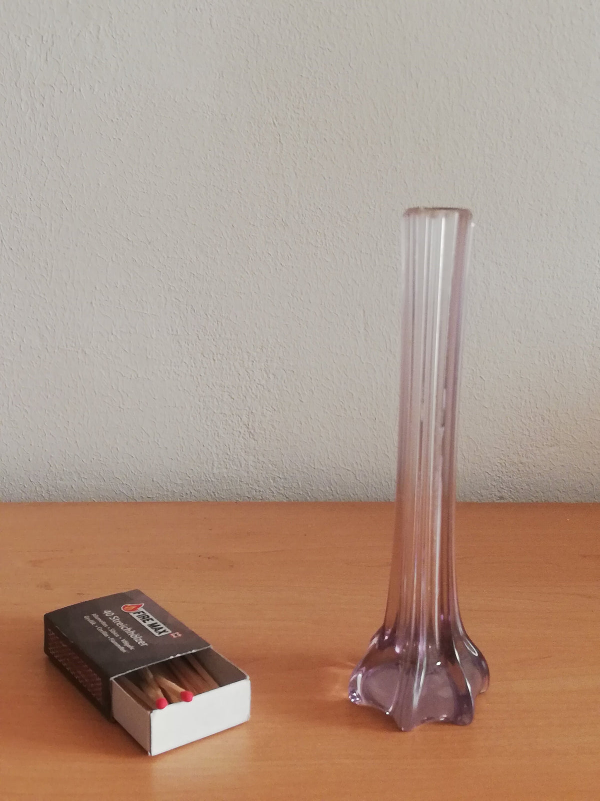 Elegant, narrow flower vase for single-stemmed flowers. graceful vase for the lunch table, purple vase as a flower decoration,