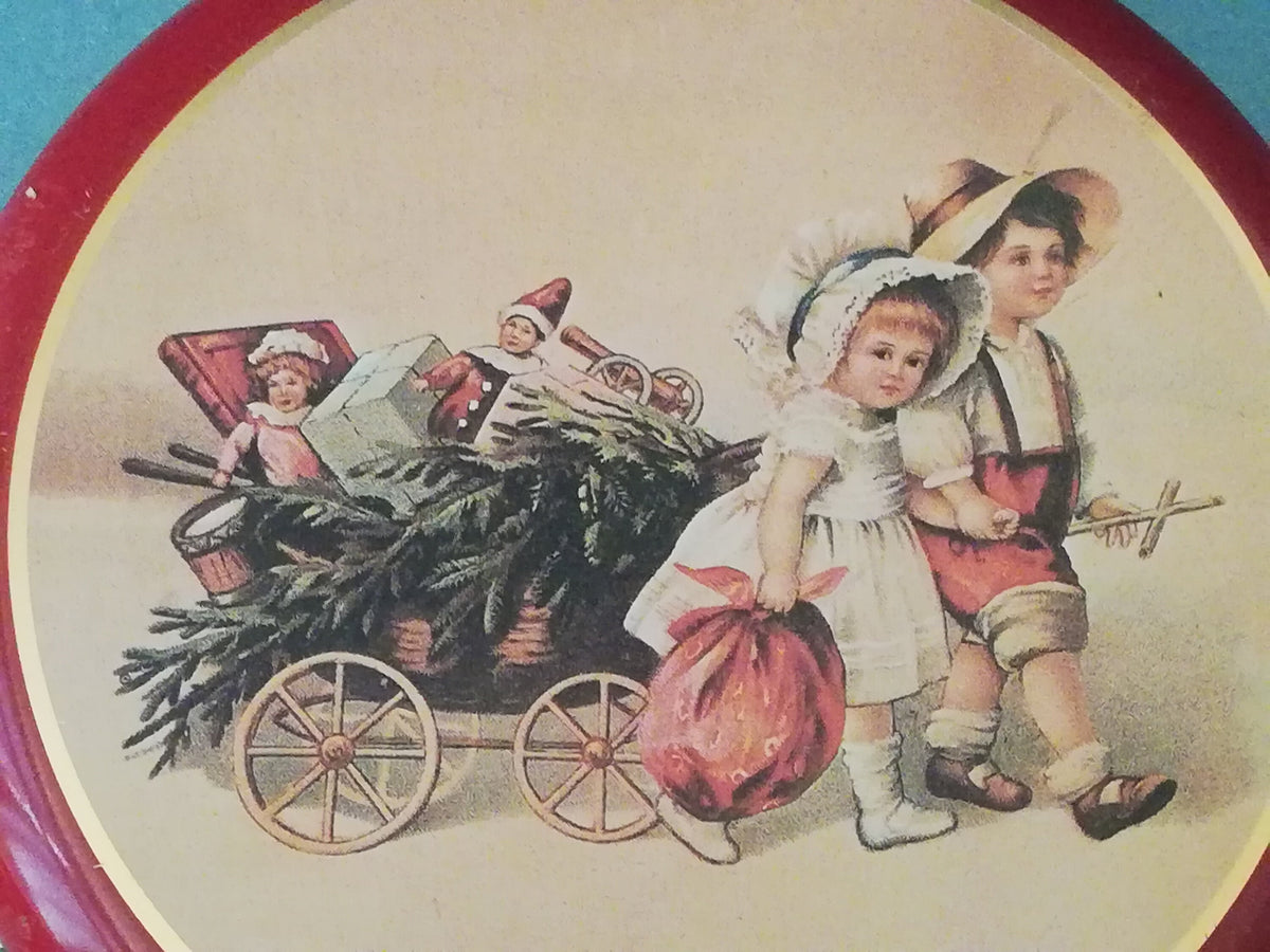 Red tin can with children playing, children pulling a cart with a Christmas tree and gifts, tin can for collectors, ,