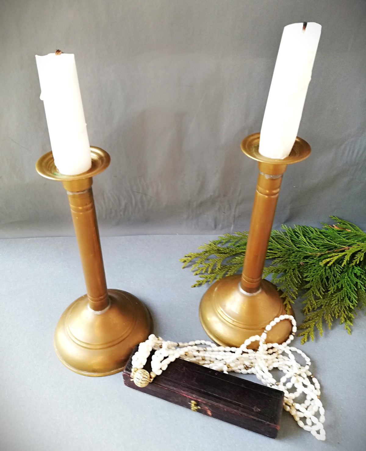 An antique brass candle holder, candle holder for a romantic dinner, candle lighting for romantic hours