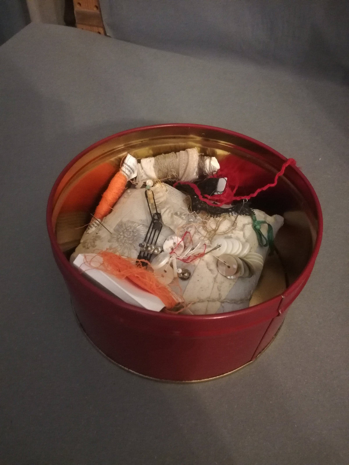 Red tin can with children playing, children pulling a cart with a Christmas tree and gifts, tin can for collectors, ,