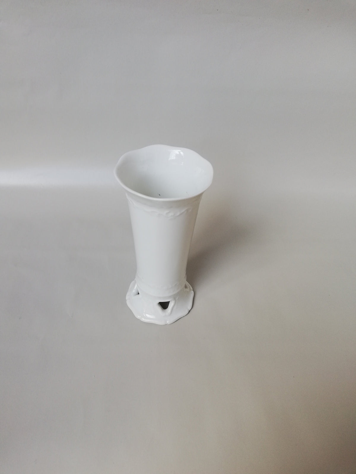 Fine porcelain vase with relief pattern and hole design - white - decorative highlight