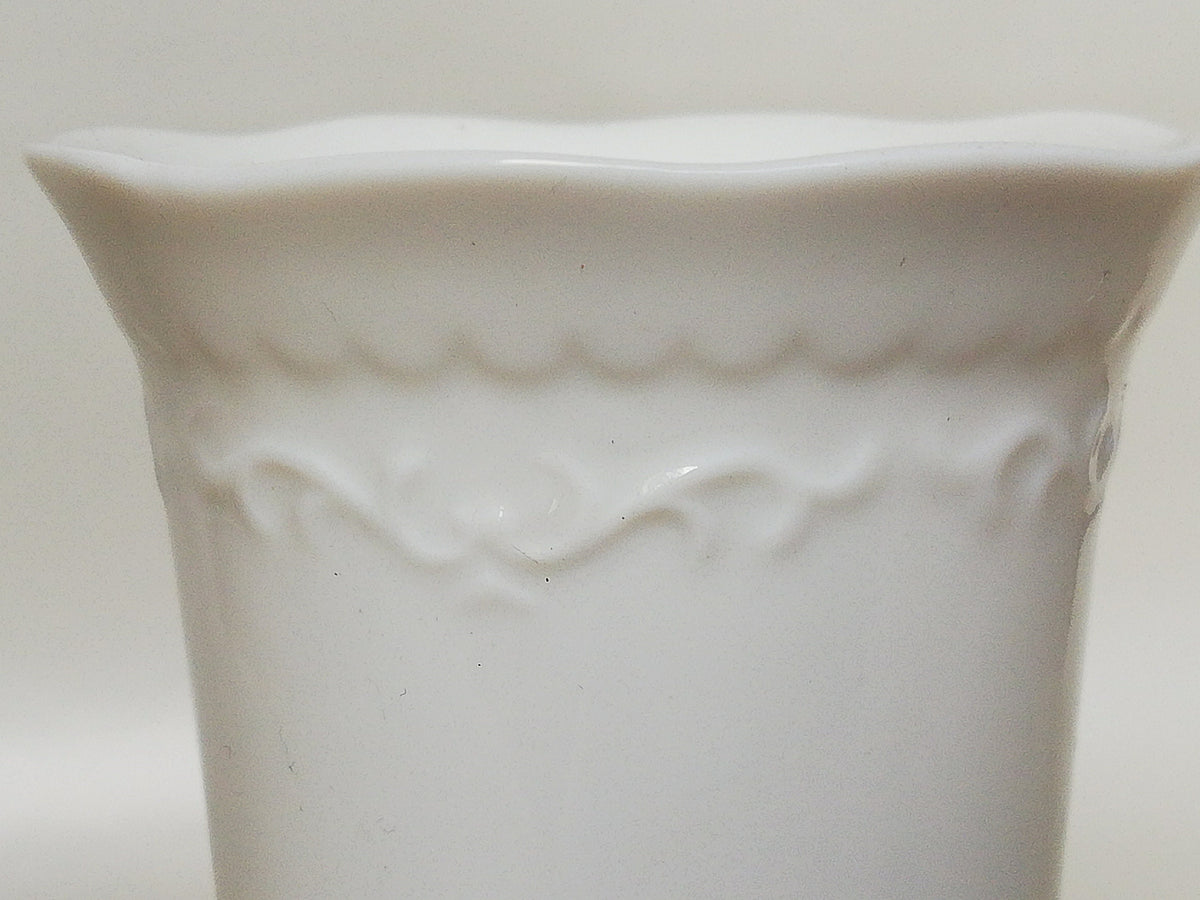 Fine porcelain vase with relief pattern and hole design - white - decorative highlight
