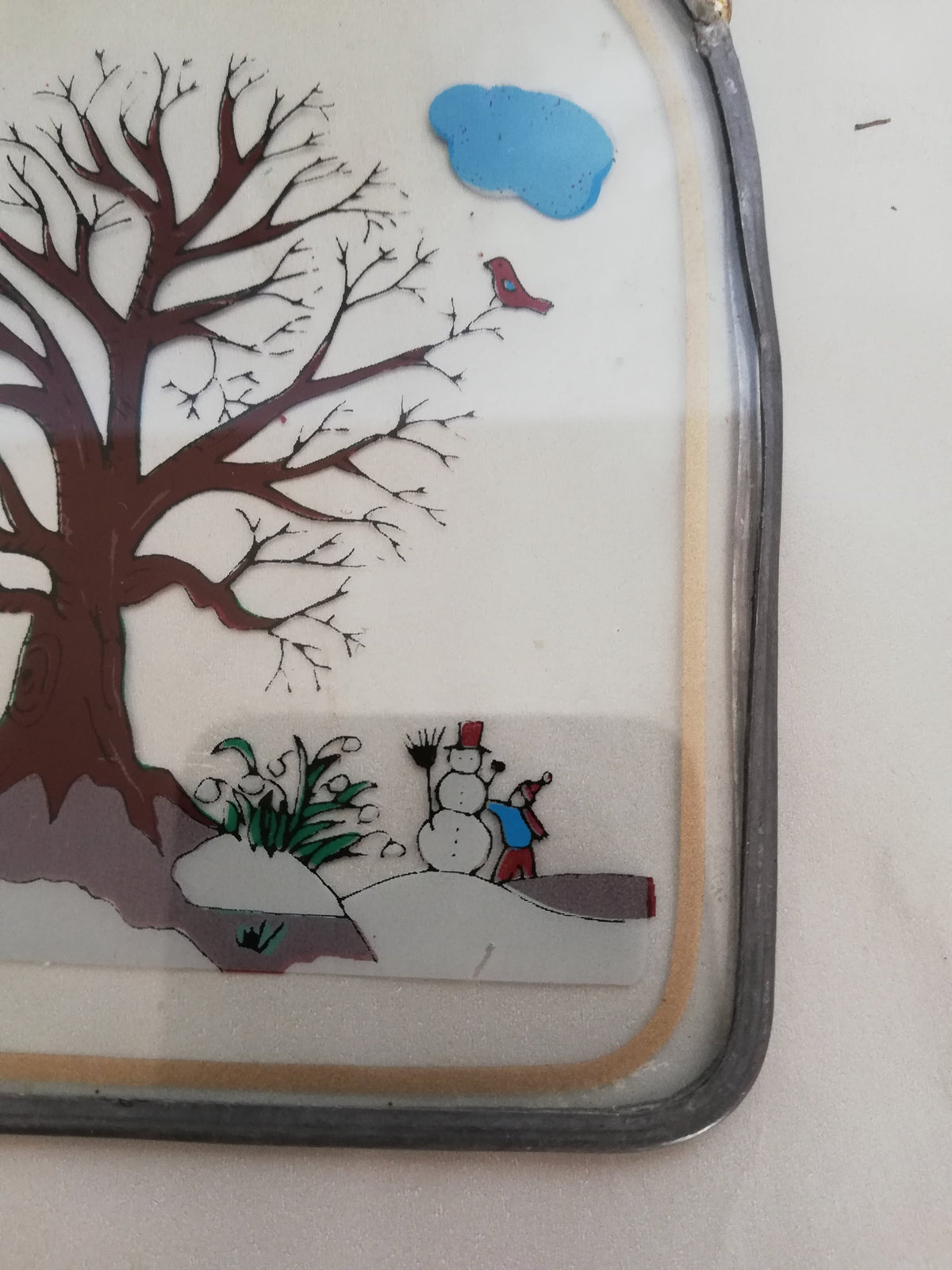 Rückseite des Glasbildes im Zinnrahmen