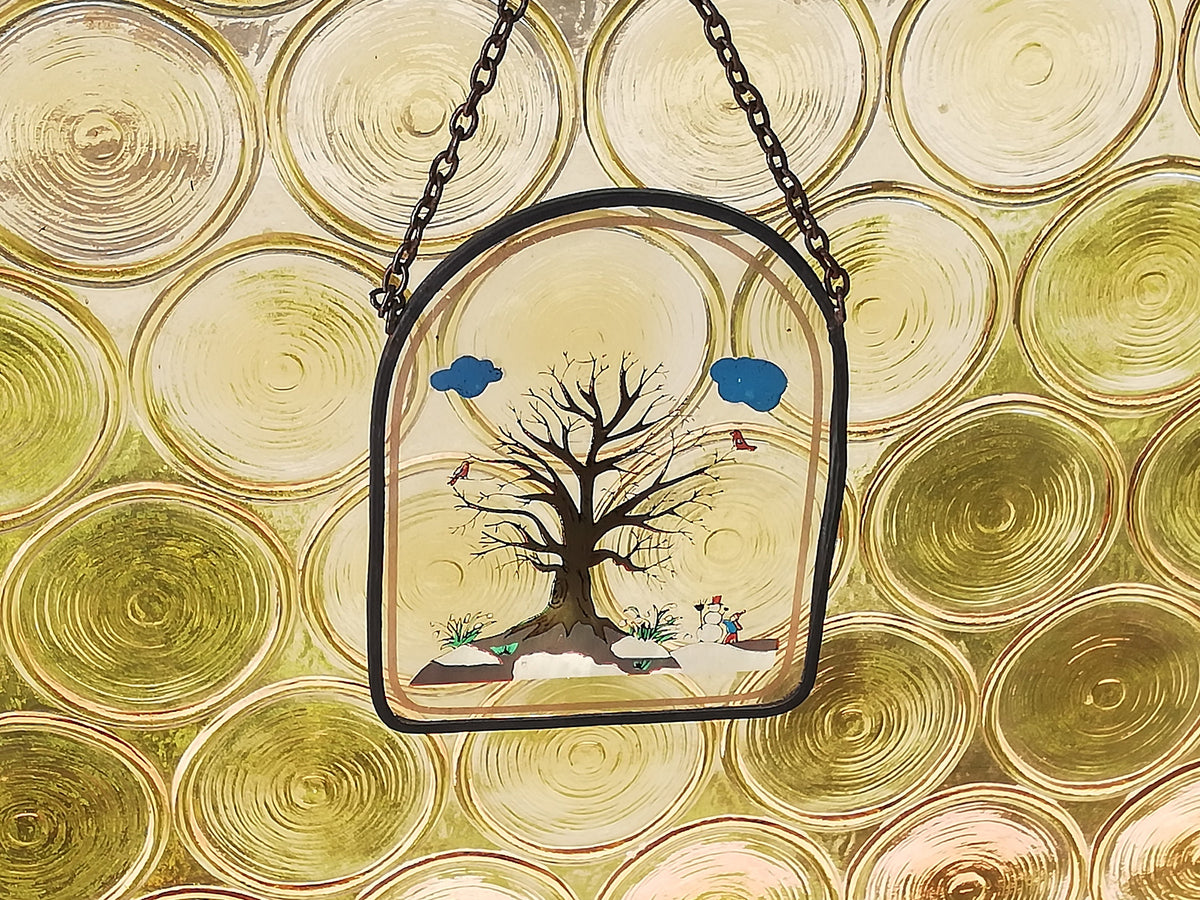 Winter-Glasbild an der Wand im Flur