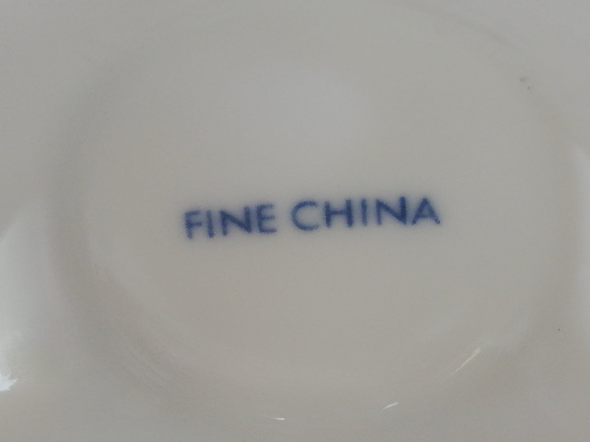 Fine porcelain vase with relief pattern and hole design - white - decorative highlight