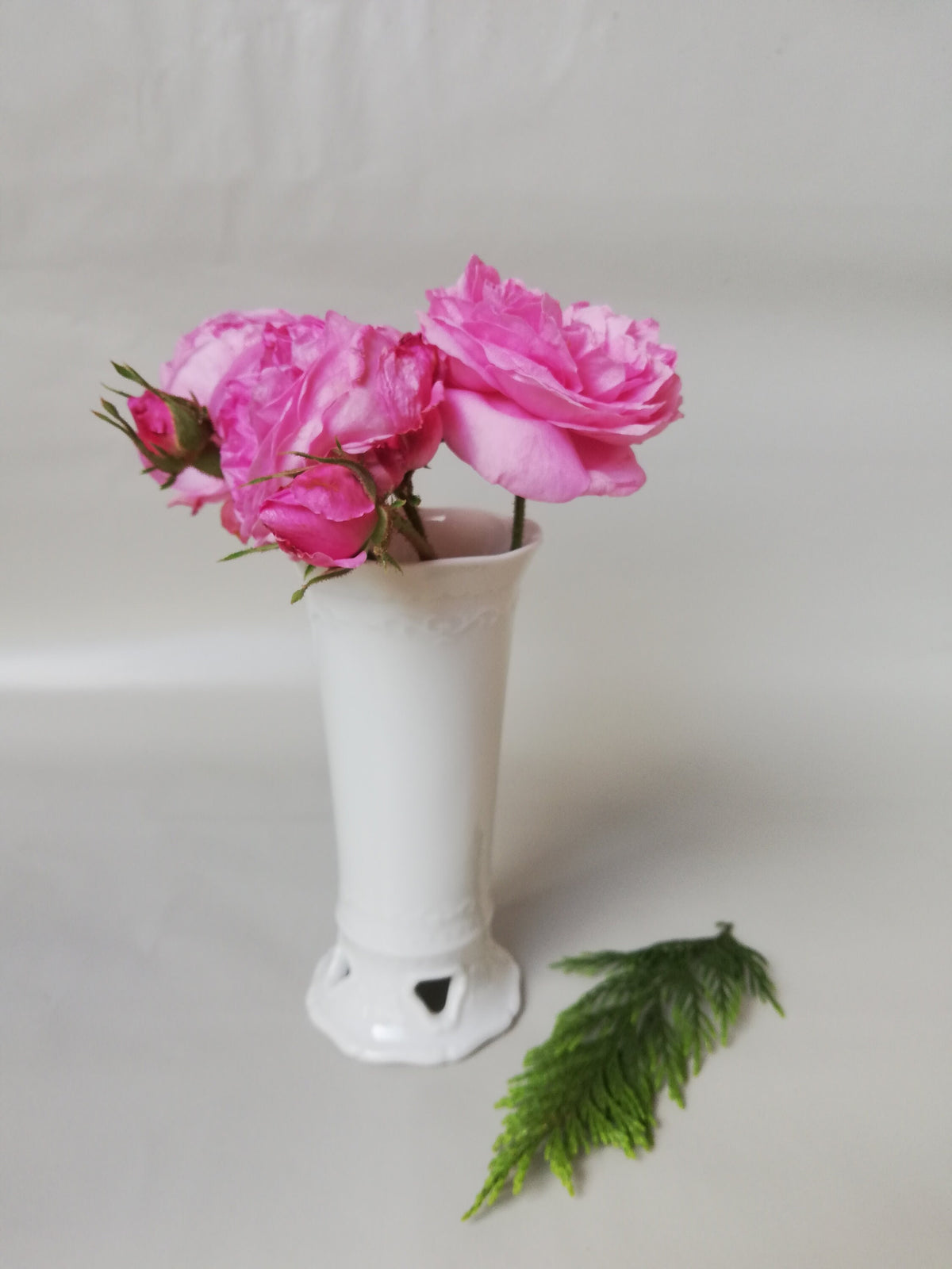 Fine porcelain vase with relief pattern and hole design - white - decorative highlight