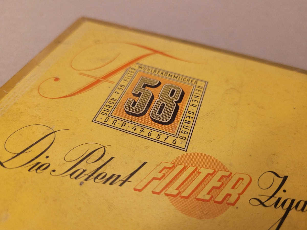 Gelb-schwarzer Deckel mit Aufschrift 50 Zigaretten