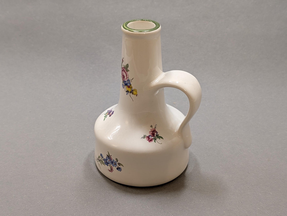 Krugvase mit einer Gartenblume