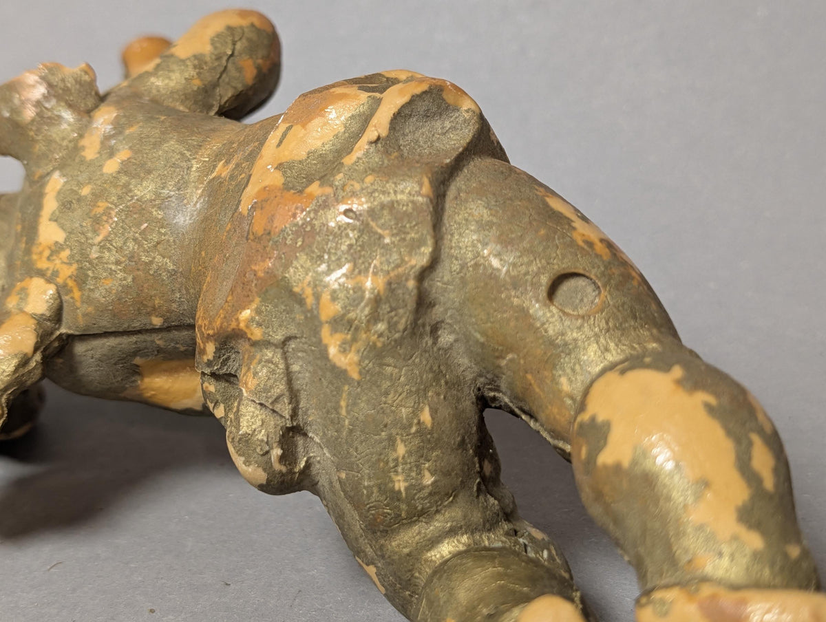 Beine und Gewand des Putto