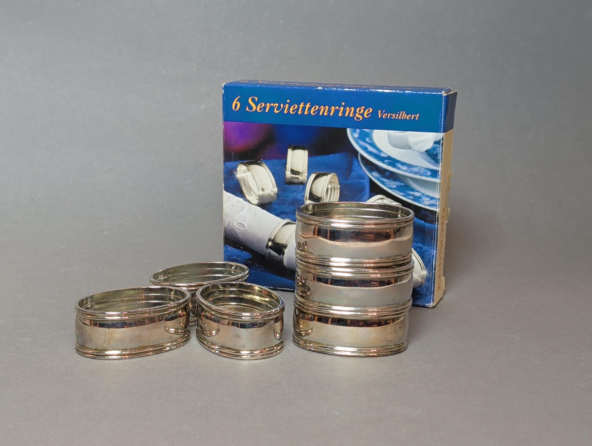 Sechs versilberte Eduscho-Serviettenringe in Originalbox, Gesamtansicht