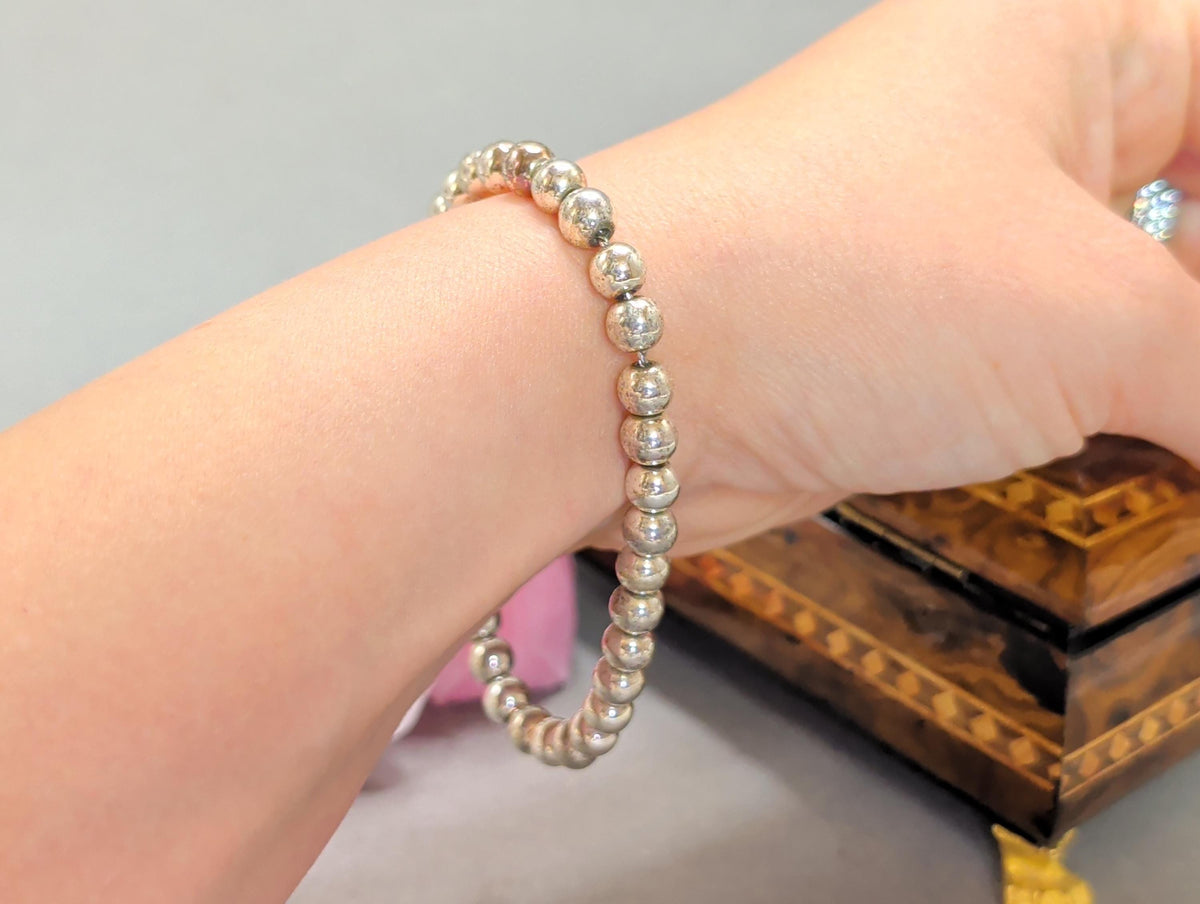 Armband mit Uhr kombiniert