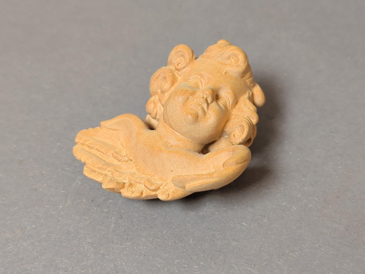 Schlafendes Gesicht des Putto